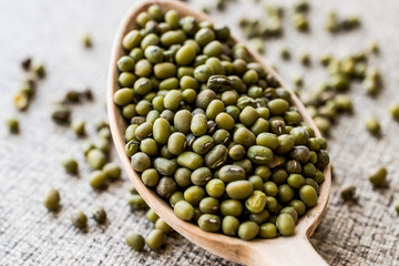 Mung Beans in wooden spoon.
