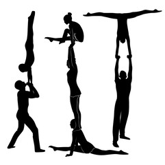 acrobatic stunt. Gymnasts acrobats vector black silhouette. Gymnasts acrobats vector - obrazy, fototapety, plakaty