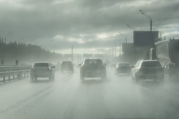 Drive car in rain on asphalt wet road. Clouds and sun. - 171960119
