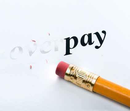 Word " overpay " and pencil with eraser close-up