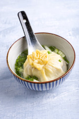 Traditional Cacasien manti as close-up in a bowl