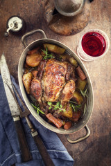 Coq au Vin with Vegetable in Burgundy Sauce as top view in a Casserole