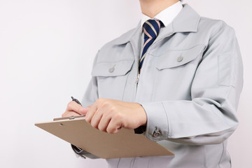 作業着 男性 ネクタイ ポーズ ボード 記入