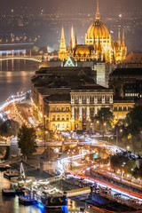 Aerial view of the streets at night and the river Danube, near to the Parliament of Budapest in Hungary