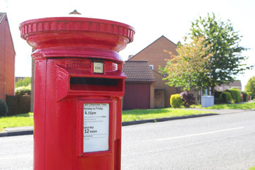 Fototapeta na wymiar Red post box in UK