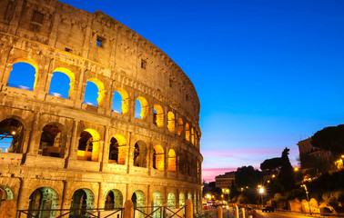 Fototapeta premium The legendary Coliseum at night , Rome, Italy