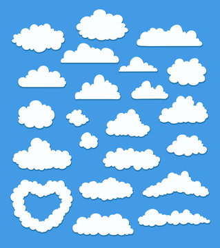 set of cartoon clouds on blue. vector illustration