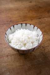 Traditional Japanese Koshihikari rice as close-up in a bowl