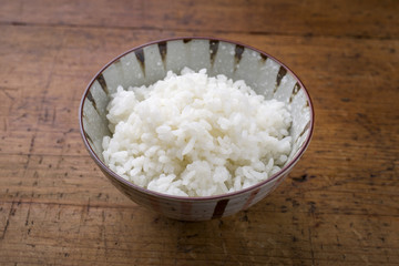Traditional Japanese koshihikari rice as close-up in a bowl