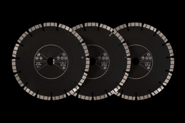 Cutting discs with diamonds - Diamond discs for concrete isolated on the black background
