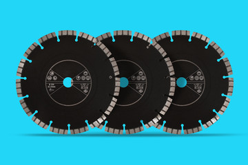 Cutting discs with diamonds - Diamond discs for concrete isolated on the blue background