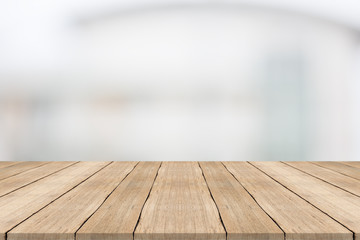 Wood table top on white blurred background from building,for montage your products