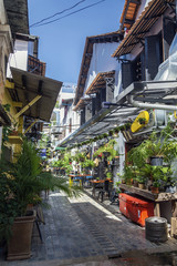 alley with tourist restaurants in siem reap old town cambodia