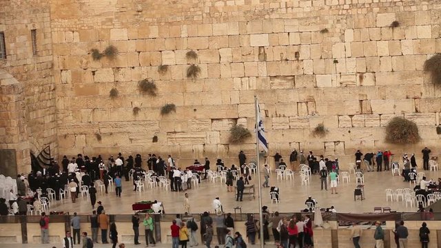 Jerusalem, Israel, Western Wall, Wailing Wall, High Angle Wide View Of Jewish Men Praying And Worshiping At The Wailing Wall Wide In Jerusalem, Timelapse