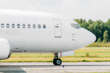 Nose cockpit pilot on the side of taxiing at the airport