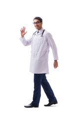 Young doctor physician standing walking isolated on white backgr