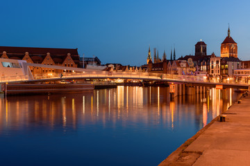 The footbridge over Motlawa river in Gdansk connecting the main town with the Ołowianka island. Poland.