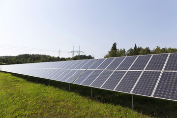 Fototapeta premium Solar Power Station on the summer Meadow 