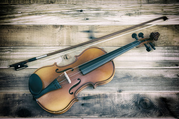still life with vintage violin rustic wooden background