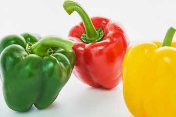 Bell pepper is a group of many colors on a white background.