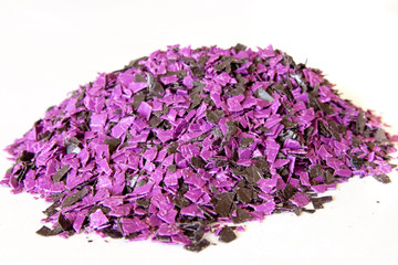 Crushed polypropylene, polystyrene. Little polypropylene for secondary use. Selective focus