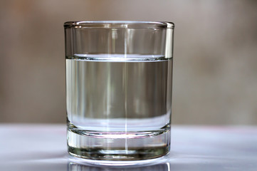 Clean drinking water in glass on the table.