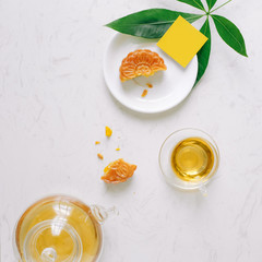 Mid-autumn festival mooncake minimalist style tea party table. Flat lay.