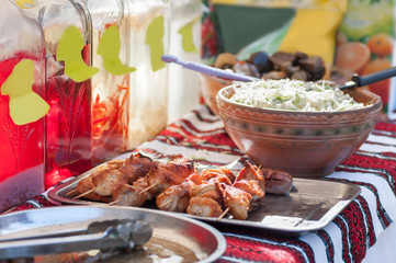 fried meat and cabbage salad showcase of a street cafe