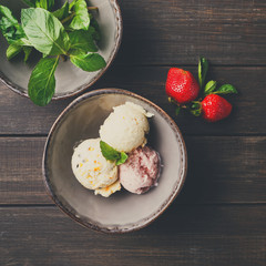 Assorted ice cream scoops in bowl top view