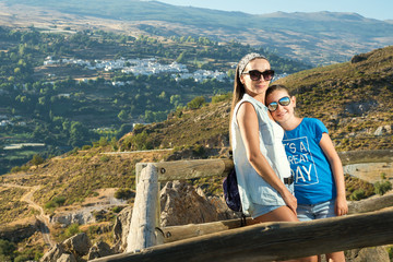 Naklejka premium the woman with the teenager on walk