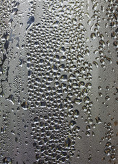 Drops on a glass surface, grey gradient
