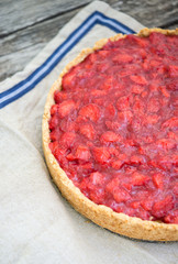 Rustic strawberry cake on wooden table