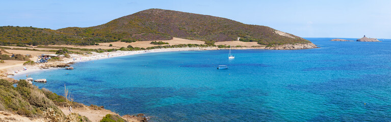 Corsica, 28/08/2017: vista della spiaggia di Tamarone, una delle più famose e selvagge del Cap Corse, circondata dalla macchia mediterranea