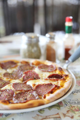 Pepperoni pizza , pizza with pepperoni mozzarella cheese and tomatoes with sauce background italian food
