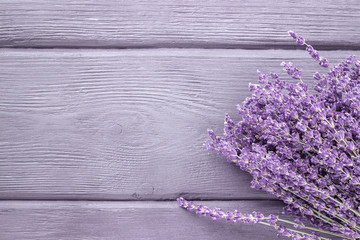 Dried lavender bunches on wooden background. Top view.