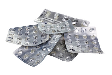 Used and empty pills blister packs isolated on white background with clipping path.