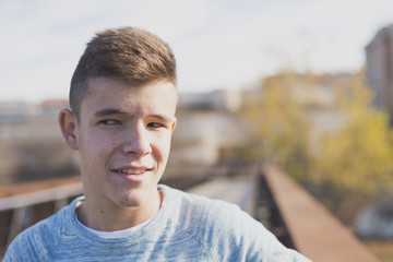 Fototapeta premium Portrait of Handsome teenage boy outdoors