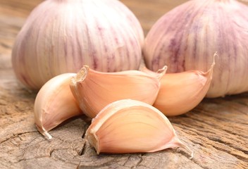  Garlic on the wooden background