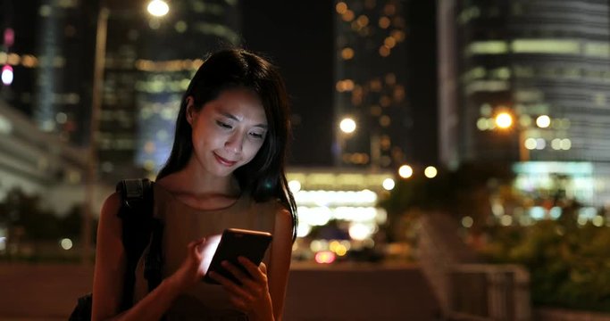 Young woman visit Hong Kong at night