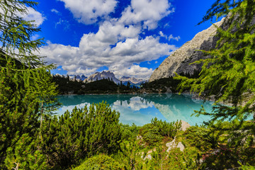 Naklejka na ściany i meble Lago di Sorapiss with amazing turquoise color of water. The mountain lake in Dolomite Alps. Italy