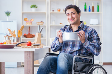 Disabled man preparing soup at kitchen