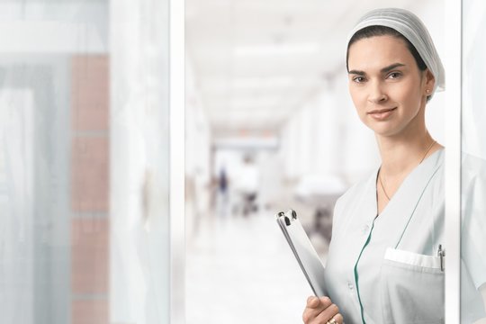 Portrait of young nurse at hospital