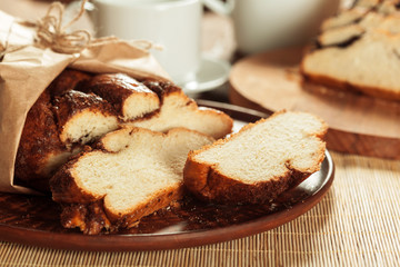 Freshly baked bread on wooden table