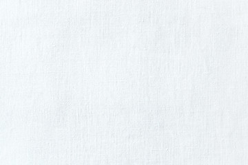 White linen fabric texture. White canvas background. Abstract woven surface.