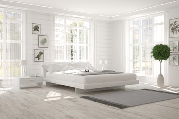 Fototapeta premium Inspiration of white minimalist bedroom with summer landscape in window. Scandinavian interior design. 3D illustration