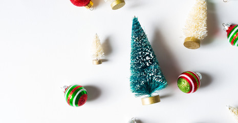 Collection of Christmas trees and ornaments from top view