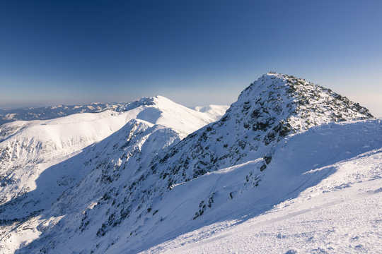 Fototapeta Ski resort in Slovakia. High mountain Tatras. Peak Chopok on sunny day. Beautiful landscape.