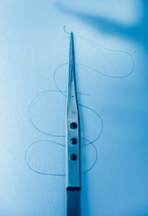 Dental tools on blue background.