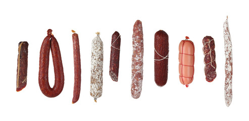 Different sausages on white background