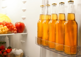 Bottles of lemonade in fridge